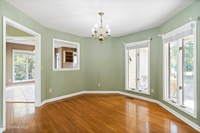 Opportunity awaits on the 7th tee! This spacious home in the on Olde Point Golf and Country Club in North Carolina - for sale on GolfHomes.com, golf home, golf lot