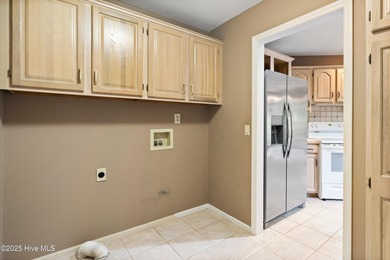 Opportunity awaits on the 7th tee! This spacious home in the on Olde Point Golf and Country Club in North Carolina - for sale on GolfHomes.com, golf home, golf lot