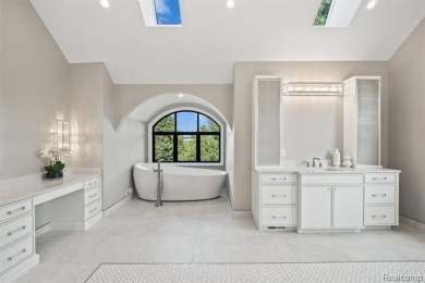 Set on over two acres along the coveted shores of all-sports on Orchard Lake Country Club in Michigan - for sale on GolfHomes.com, golf home, golf lot