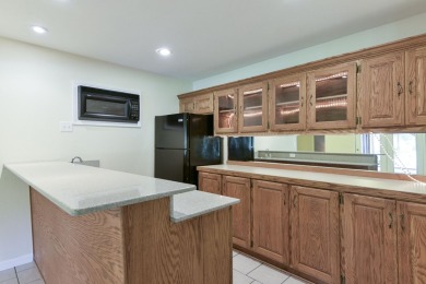 Updated home with an incredible golf course view overlooking the on Pointe Royale Village Country Club in Missouri - for sale on GolfHomes.com, golf home, golf lot
