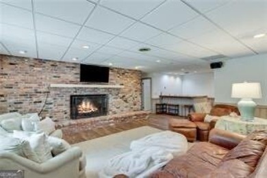 A Timeless Treasure in Chattahoochee Estates    Set on a on Chattahoochee Golf Course in Georgia - for sale on GolfHomes.com, golf home, golf lot