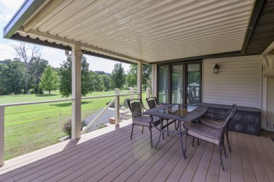 Updated home with an incredible golf course view overlooking the on Pointe Royale Village Country Club in Missouri - for sale on GolfHomes.com, golf home, golf lot