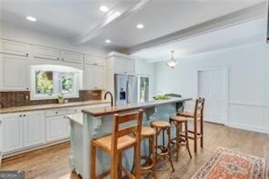 A Timeless Treasure in Chattahoochee Estates    Set on a on Chattahoochee Golf Course in Georgia - for sale on GolfHomes.com, golf home, golf lot