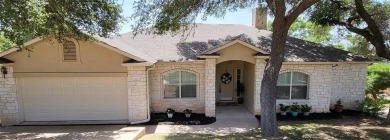 Discover tranquility in this beautiful single story residence on Lago Vista Golf Club in Texas - for sale on GolfHomes.com, golf home, golf lot