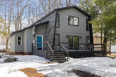 Welcome to this charming Pocono Chalet, nestled in an on Pocono Farms Country Club in Pennsylvania - for sale on GolfHomes.com, golf home, golf lot