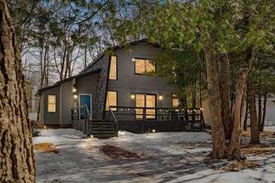 Welcome to this charming Pocono Chalet, nestled in an on Pocono Farms Country Club in Pennsylvania - for sale on GolfHomes.com, golf home, golf lot