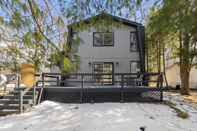 Welcome to this charming Pocono Chalet, nestled in an on Pocono Farms Country Club in Pennsylvania - for sale on GolfHomes.com, golf home, golf lot