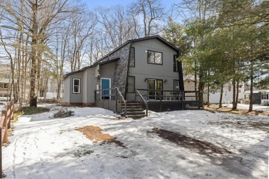 Welcome to this charming Pocono Chalet, nestled in an on Pocono Farms Country Club in Pennsylvania - for sale on GolfHomes.com, golf home, golf lot