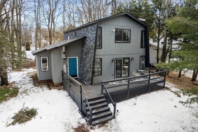 Welcome to this charming Pocono Chalet, nestled in an on Pocono Farms Country Club in Pennsylvania - for sale on GolfHomes.com, golf home, golf lot