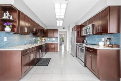 Just Listed!  Lovely 2 Bedroom, 2.5 Bath Condominium features a on  in Florida - for sale on GolfHomes.com, golf home, golf lot