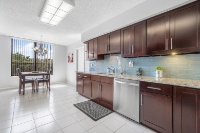 Just Listed!  Lovely 2 Bedroom, 2.5 Bath Condominium features a on  in Florida - for sale on GolfHomes.com, golf home, golf lot