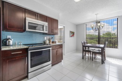 Just Listed!  Lovely 2 Bedroom, 2.5 Bath Condominium features a on  in Florida - for sale on GolfHomes.com, golf home, golf lot
