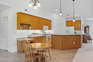 Exceptionally kept, custom-built home located on corner lot on The Carolina Club in North Carolina - for sale on GolfHomes.com, golf home, golf lot