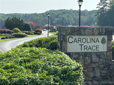 Welcome to the exclusive Carolina Trace community. This lot is on Carolina Trace Country Club in North Carolina - for sale on GolfHomes.com, golf home, golf lot