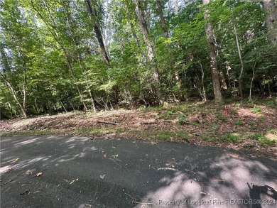 Welcome to the exclusive Carolina Trace community. This lot is on Carolina Trace Country Club in North Carolina - for sale on GolfHomes.com, golf home, golf lot