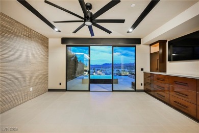 Perched elegantly above the shimmering waters of Lake Las Vegas on Reflection Bay Golf Club in Nevada - for sale on GolfHomes.com, golf home, golf lot