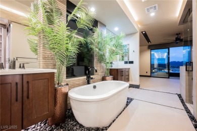 Perched elegantly above the shimmering waters of Lake Las Vegas on Reflection Bay Golf Club in Nevada - for sale on GolfHomes.com, golf home, golf lot