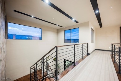 Perched elegantly above the shimmering waters of Lake Las Vegas on Reflection Bay Golf Club in Nevada - for sale on GolfHomes.com, golf home, golf lot