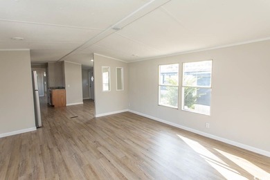 Newly renovated oversized single-wide manufactured home situated on Prestwick Country Club in South Carolina - for sale on GolfHomes.com, golf home, golf lot