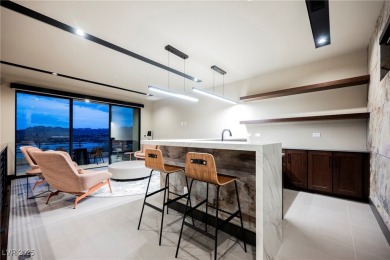 Perched elegantly above the shimmering waters of Lake Las Vegas on Reflection Bay Golf Club in Nevada - for sale on GolfHomes.com, golf home, golf lot