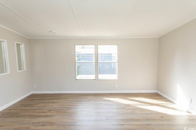 Newly renovated oversized single-wide manufactured home situated on Prestwick Country Club in South Carolina - for sale on GolfHomes.com, golf home, golf lot