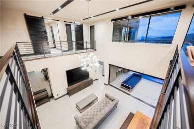 Perched elegantly above the shimmering waters of Lake Las Vegas on Reflection Bay Golf Club in Nevada - for sale on GolfHomes.com, golf home, golf lot