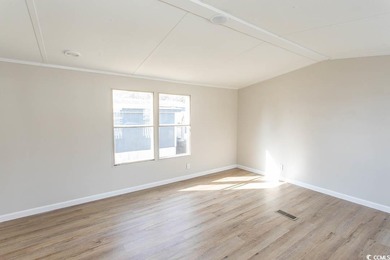 Newly renovated oversized single-wide manufactured home situated on Prestwick Country Club in South Carolina - for sale on GolfHomes.com, golf home, golf lot