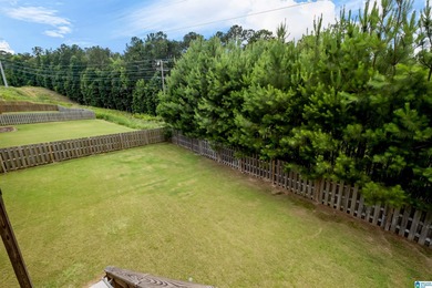With one of the largest private backyards in the neighborhood on Old Overton Club in Alabama - for sale on GolfHomes.com, golf home, golf lot