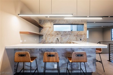 Perched elegantly above the shimmering waters of Lake Las Vegas on Reflection Bay Golf Club in Nevada - for sale on GolfHomes.com, golf home, golf lot