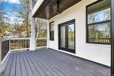 Welcome to a truly magnificent, all-brick, luxury estate in the on Whitewater Creek in Georgia - for sale on GolfHomes.com, golf home, golf lot