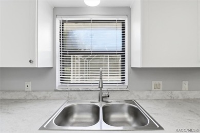 It's a TRAP! You'll get stuck and fall in love with this one on Citrus Springs Country Club in Florida - for sale on GolfHomes.com, golf home, golf lot