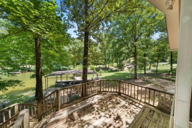 Cute open floorplan cottage on Lake Catherine in Diamondhead on Diamondhead Golf and Country Club in Arkansas - for sale on GolfHomes.com, golf home, golf lot