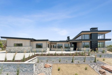 Thoughtfully designed with 6,549 sq ft of refined living space on Red Ledges Golf Club in Utah - for sale on GolfHomes.com, golf home, golf lot
