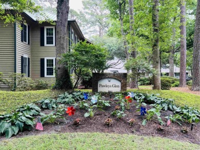 Enjoy the exclusivity of low-country coastal living at its on Pawleys Plantation Golf and Country Club in South Carolina - for sale on GolfHomes.com, golf home, golf lot