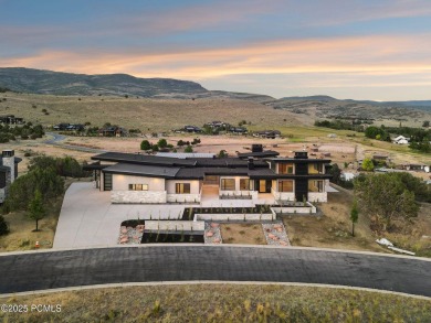 Thoughtfully designed with 6,549 sq ft of refined living space on Red Ledges Golf Club in Utah - for sale on GolfHomes.com, golf home, golf lot