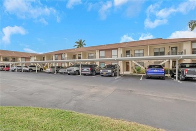 This well-appointed first-floor condo has stunning lake views on Riviera Golf Club in Florida - for sale on GolfHomes.com, golf home, golf lot