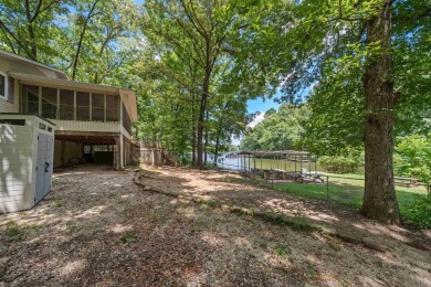 Cute open floorplan cottage on Lake Catherine in Diamondhead on Diamondhead Golf and Country Club in Arkansas - for sale on GolfHomes.com, golf home, golf lot