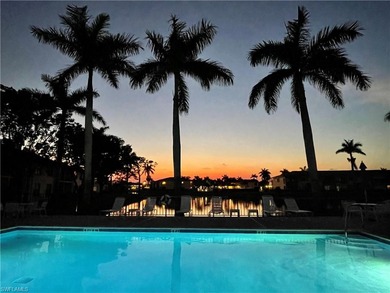 This well-appointed first-floor condo has stunning lake views on Riviera Golf Club in Florida - for sale on GolfHomes.com, golf home, golf lot