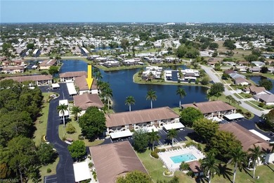 This well-appointed first-floor condo has stunning lake views on Riviera Golf Club in Florida - for sale on GolfHomes.com, golf home, golf lot