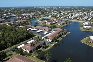 This well-appointed first-floor condo has stunning lake views on Riviera Golf Club in Florida - for sale on GolfHomes.com, golf home, golf lot