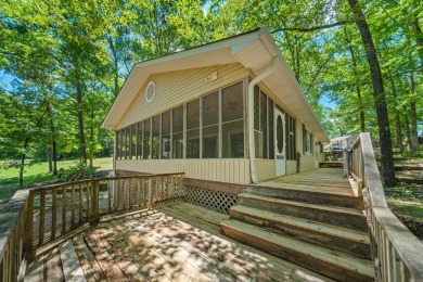 Cute open floorplan cottage on Lake Catherine in Diamondhead on Diamondhead Golf and Country Club in Arkansas - for sale on GolfHomes.com, golf home, golf lot