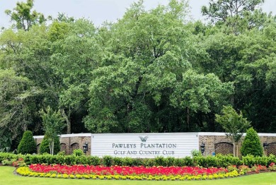 Enjoy the exclusivity of low-country coastal living at its on Pawleys Plantation Golf and Country Club in South Carolina - for sale on GolfHomes.com, golf home, golf lot