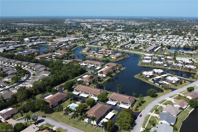 This well-appointed first-floor condo has stunning lake views on Riviera Golf Club in Florida - for sale on GolfHomes.com, golf home, golf lot