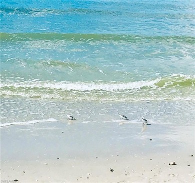 This well-appointed first-floor condo has stunning lake views on Riviera Golf Club in Florida - for sale on GolfHomes.com, golf home, golf lot