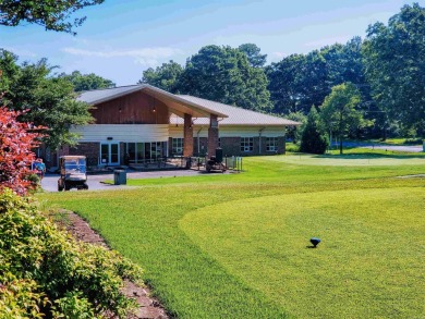 Cute open floorplan cottage on Lake Catherine in Diamondhead on Diamondhead Golf and Country Club in Arkansas - for sale on GolfHomes.com, golf home, golf lot