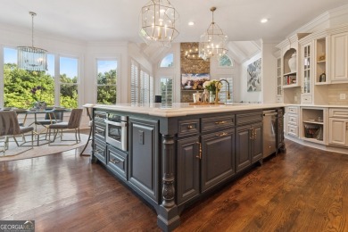 Privately tucked behind a long, tree-lined driveway and greeted on Chateau Elan Golf Club  in Georgia - for sale on GolfHomes.com, golf home, golf lot