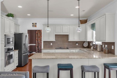 Who wishes half of their HOA fees could be paid for the first 2 on Cape Fear National At Brunswick Forest in North Carolina - for sale on GolfHomes.com, golf home, golf lot