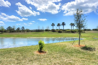 This home just built in 2022 and now available for quick move in on Sarasota National Golf Club in Florida - for sale on GolfHomes.com, golf home, golf lot
