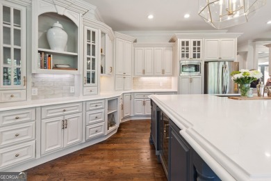Privately tucked behind a long, tree-lined driveway and greeted on Chateau Elan Golf Club  in Georgia - for sale on GolfHomes.com, golf home, golf lot