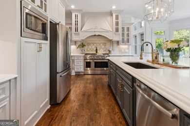 Privately tucked behind a long, tree-lined driveway and greeted on Chateau Elan Golf Club  in Georgia - for sale on GolfHomes.com, golf home, golf lot